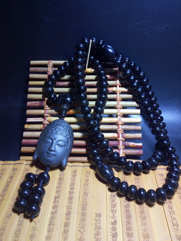 黑冰树化玉108佛珠 藏品名称:黑冰树化玉108佛珠 石种:辽西树化 